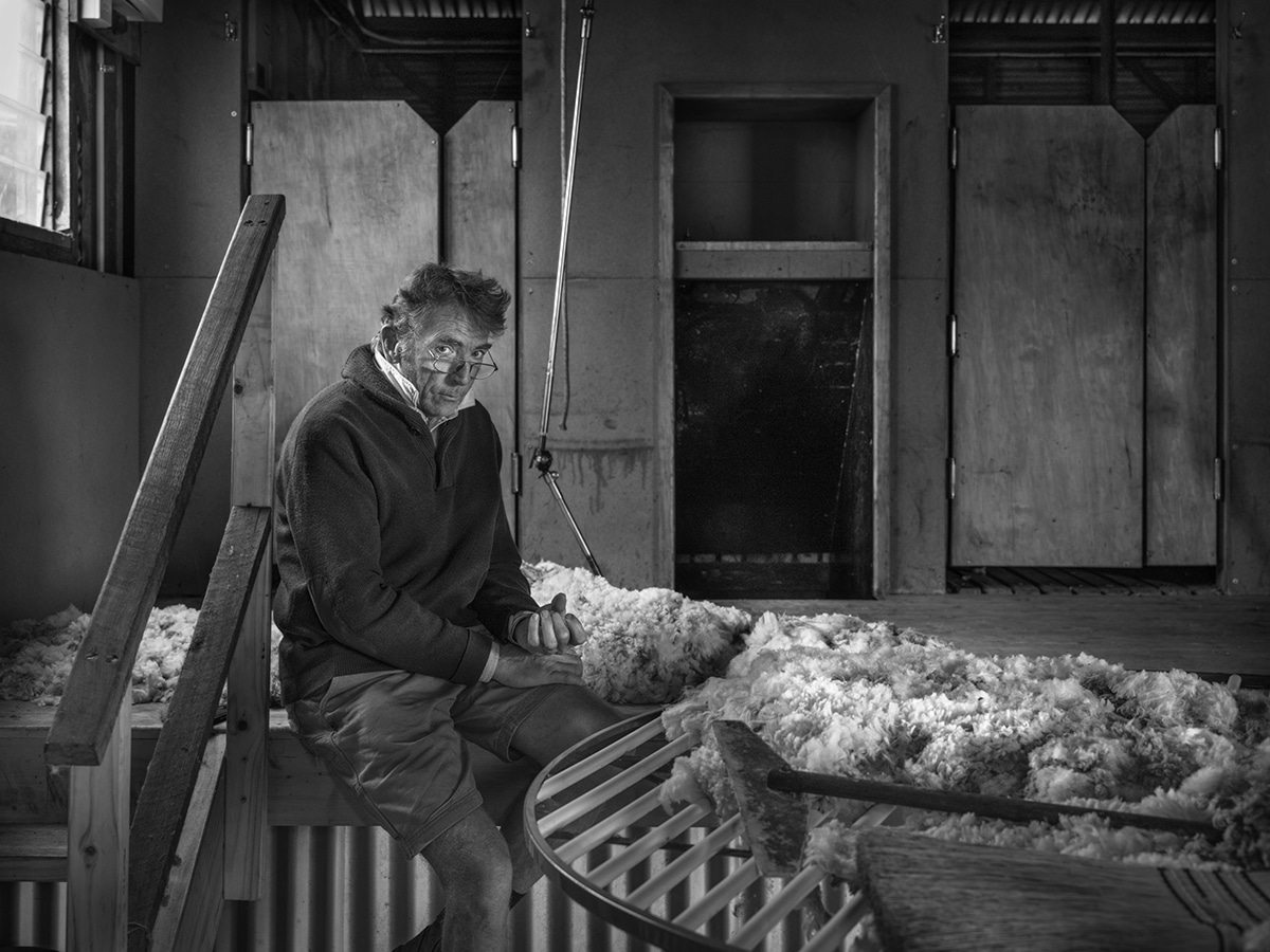 Tim in the wool shearing shed, Tiverton